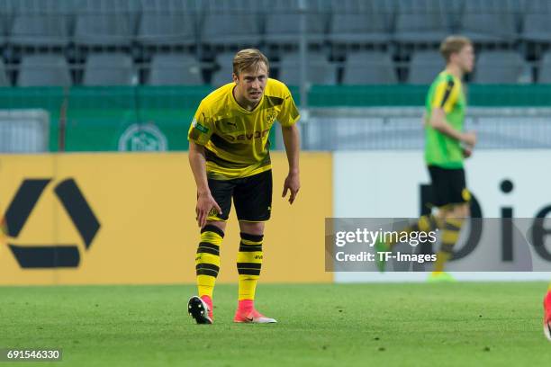 Felix Passlack of Dortmund injured during the U19 German Championship Final match between U19 Borussia Dortmund and U19 Bayern Muenchen at Signal...