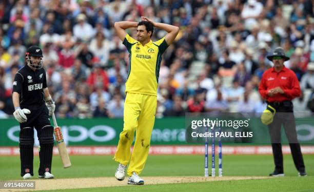 Australia's Mitchell Starc reacts while bowling during the ICC Champions trophy cricket match between Australia and New Zealand at Edgbaston in...