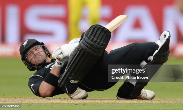 Corey Anderson of New Zealand falls to the ground during the ICC Champions Trophy match between Australia and New Zealand at Edgbaston cricket ground...