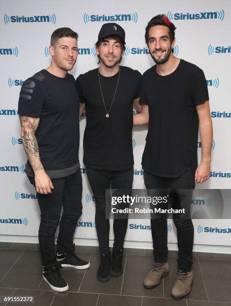 Zack Merrick, Alex Gaskarth and Jack Barakat of All Time Low visit at SiriusXM Studios on June 2, 2017 in New York City.