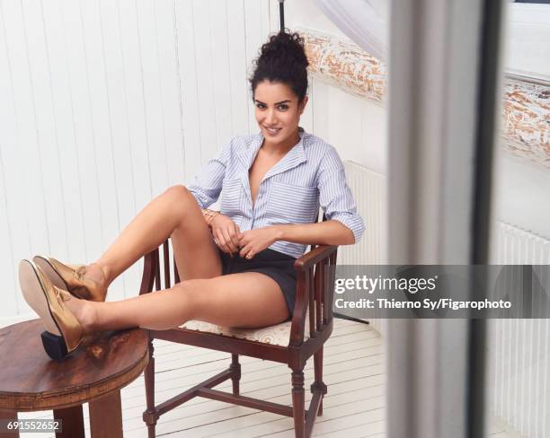 Actress Sabrina Ouazani is photographed for Madame Figaro on February 1, 2017 in Paris, France. Shirt , shorts , cuff and ring , shoes . CREDIT MUST...