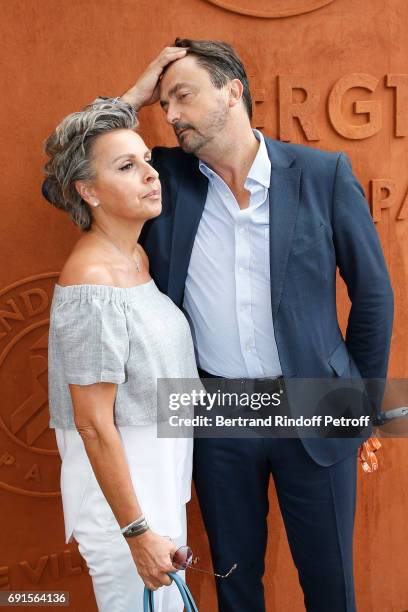 Henri Leconte and his wife Maria Dowlatshahi attend the 2017 French Tennis Open - Day Six at Roland Garros at Roland Garros on June 2, 2017 in Paris,...