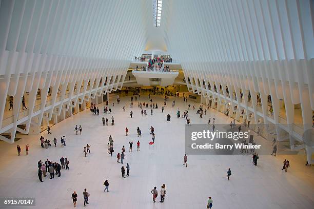people inside oculus at world trade center - world trade center manhattan imagens e fotografias de stock