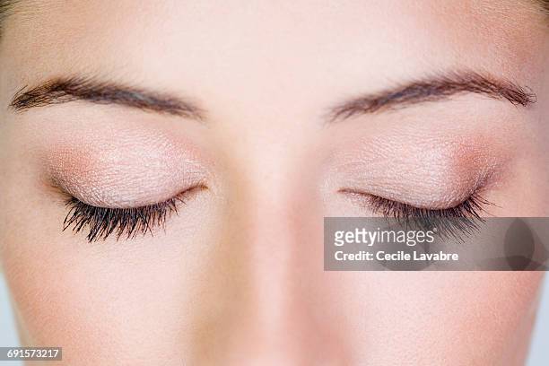 woman's closed eyes, close-up - lid stock pictures, royalty-free photos & images