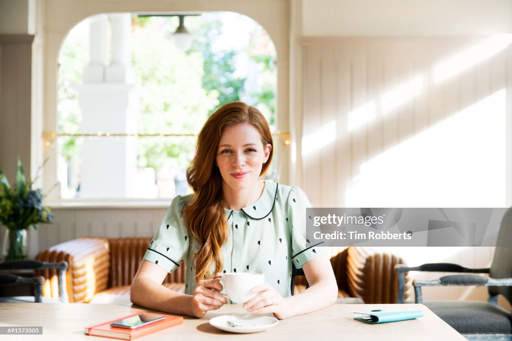 Portrait of woman with drink