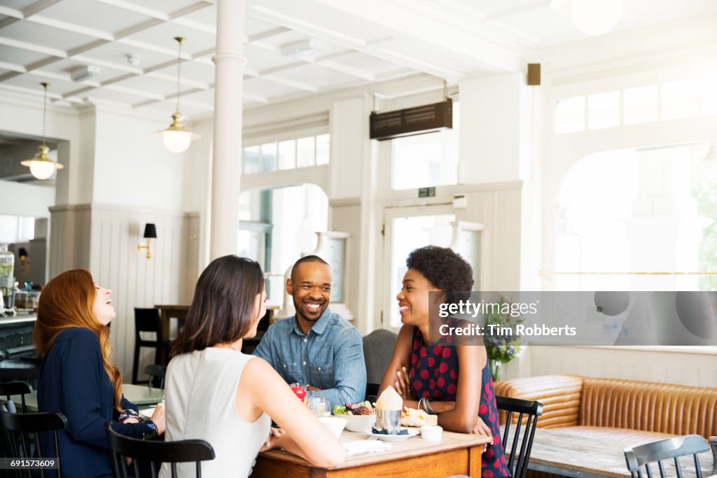 Four people having lunch