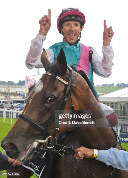 Frankie Dettori, riding Enable, celebrates winning the Investec Oaks race during Ladies Day of the 2017 Investec Derby Festival at The Jockey Club's...