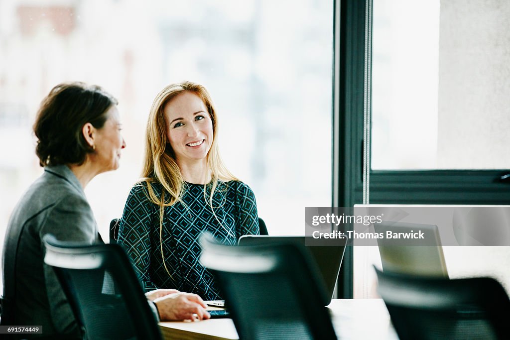 Businesswomen meeting in office conference room