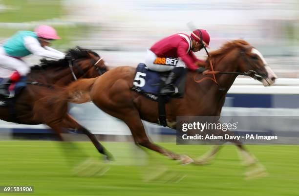 Solomon's Bay ridden by Silvestre de Sousa wins the Investec Savings Surrey Stakes on Ladies Day during the 2017 Investec Epsom Derby Festival at...