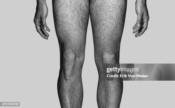 parts of nude body of man on grey background - nua imagens e fotografias de stock