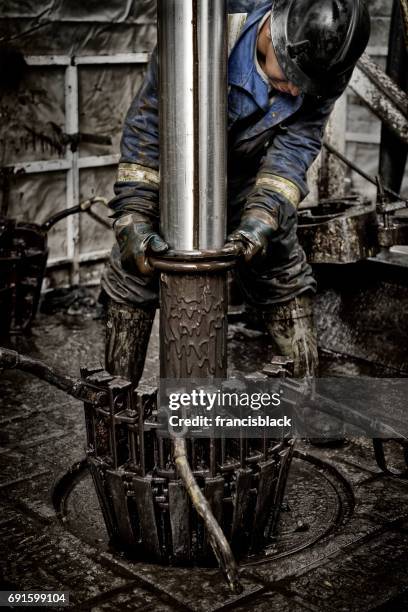 oil rig worker 2.0 - oil industry stock pictures, royalty-free photos & images