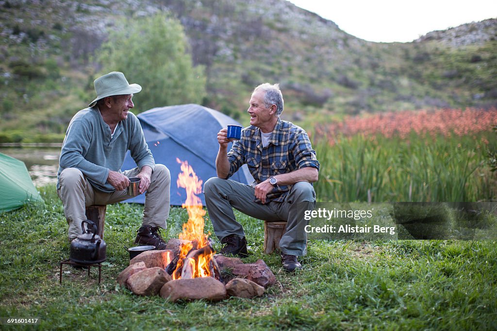 Senior men camping outdoors