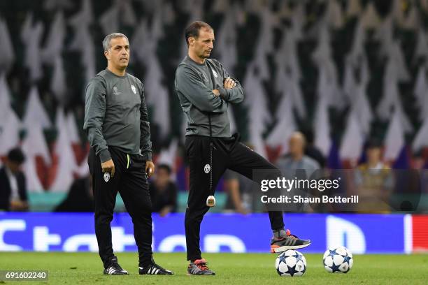 Aldo Dolcetti, Juventus technical assistant and Massimiliano Allegri, Manager of Juventus look on during a Juventus training session prior to the...