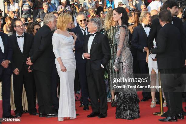 Eva Green, director Roman Polanski and Emmanuelle Seigner attend the "Based On A True Story" screening during the 70th annual Cannes Film Festival at...
