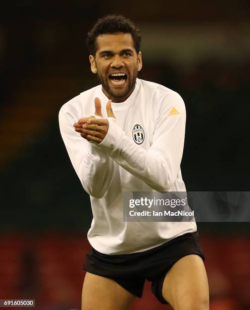 Daniel Alves of Juventus reacts during a training session prior to The UEFA Champions League Final between Juventus and Real Madrid at the National...