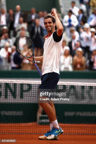 Albert Ramos-Vinolas of Spain celebrates victory during mens singles third round match against Lucas Pouille of France on day six of the 2017 French...