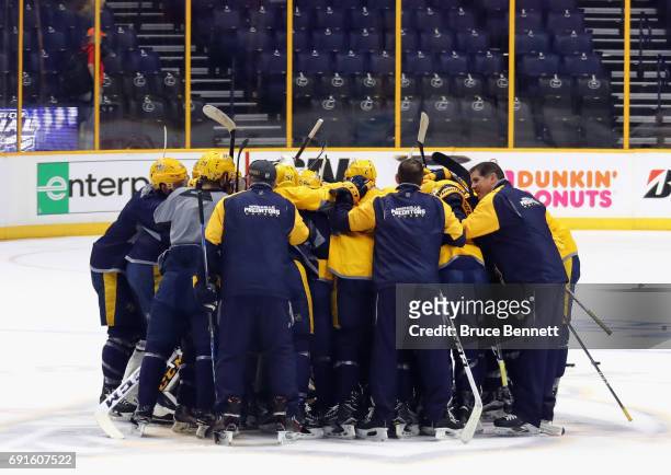 The Nashville Predators gather for a chat during a practice session in the 2017 NHL Stanley Cup Finals at Bridgestone Arena on June 2, 2017 in...