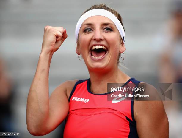 Timea Bacsinszky of Switzerland celebrates victory following the ladies singles third round match against Ons Jabeur of Tunisia on day six of the...