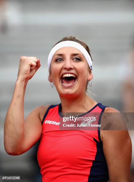 Timea Bacsinszky of Switzerland celebrates victory following the ladies singles third round match against Ons Jabeur of Tunisia on day six of the...