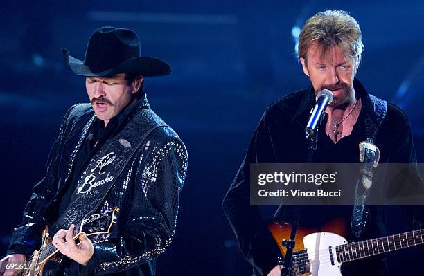 Kix Brooks and Ronnie Dunn of Brooks & Dunn perform during the 29th Annual American Music Awards at the Shrine Auditorium January 9, 2002 in Los...