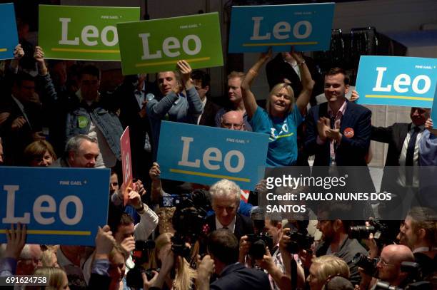 Supporters of Fine Gael TD for Dublin West and Minister for Social Protection, Leo Varadkar, celebrate his victory in the party leadership election,...