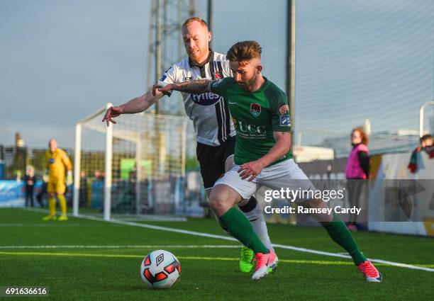 Louth , Ireland - 2 June 2017; Sean Maguire of Cork City is tackled by Chris Shields of Dundalk during the SSE Airtricity League Premier Division...