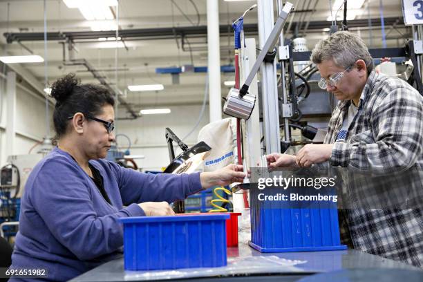 Injection Operator Assistant Plastic Injection Machine Photos and Premium High Res Pictures - Getty ...