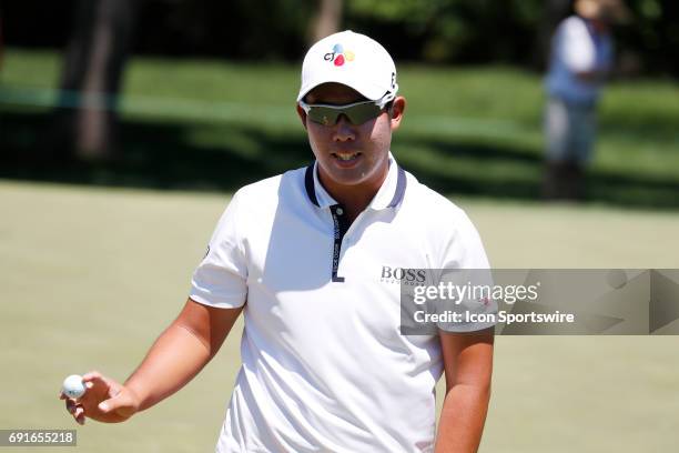 Golfer Byeong Hun An putts out on the first hole during the Memorial Tournament - Second Round on June 02, 2017 at Muirfield Village Golf Club in...