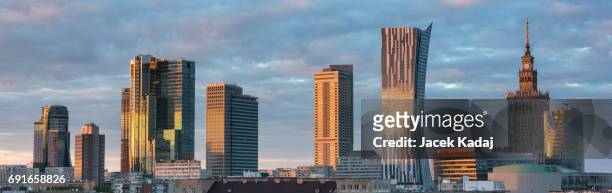 sunset over warsaw city panorama - warsaw aerial stock pictures, royalty-free photos & images