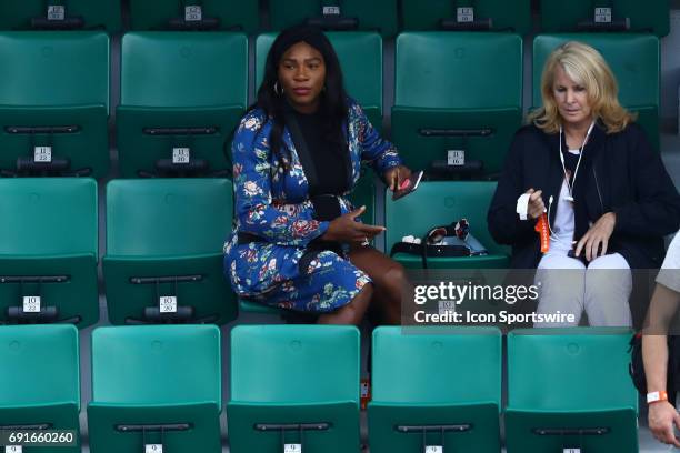 And manager JILL SMOLLER of William Morris Endeavor watches sister VENUS WILLIAMS during day six match of the 2017 French Open on June 2 at Stade...