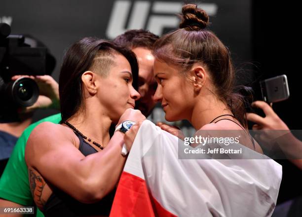 Claudia Gadelha of Brazil and Karolina Kowalkiewicz of Poland face off during the UFC 212 weigh-in at Jeunesse Arena on June 2, 2017 in Rio de...