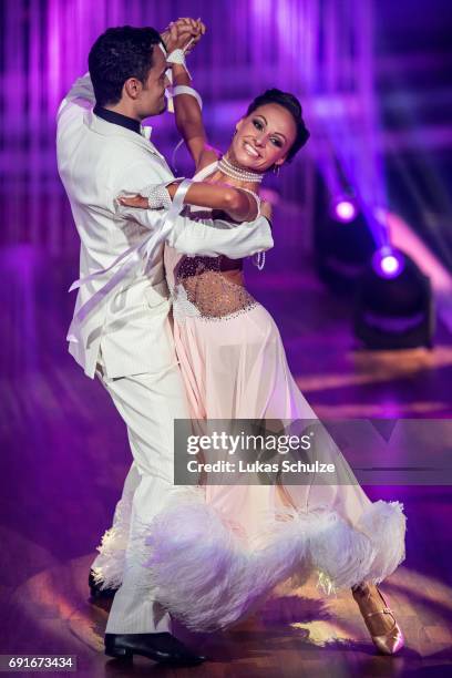 Giovanni Zarrella and Marta Arndt perform on stage during the semi final of the tenth season of the television competition 'Let's Dance' on June 2,...