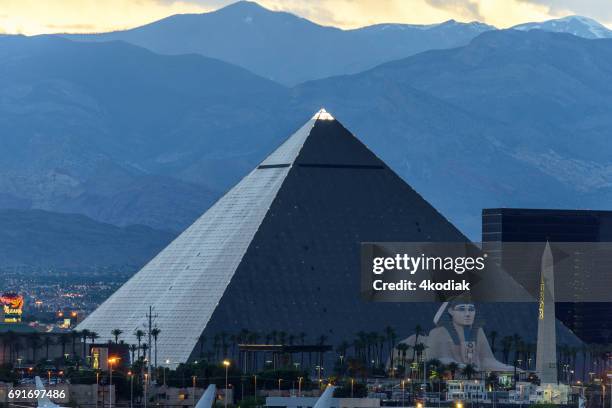 casinos at las vegas in the evening nevada in winter 2017 - las vegas pyramid stock pictures, royalty-free photos & images