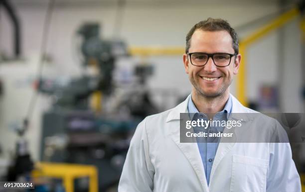 portrait of a happy engineering teacher - industrial designer stock pictures, royalty-free photos & images