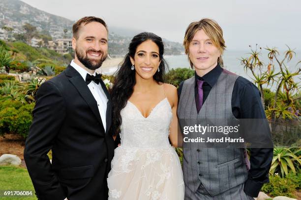 Hunter Hickman, Rewa Zakharia and Johnny Rzeznik of the Goo Goo Dolls following a Surprise Performance at BRIDES Live Wedding on June 2, 2017 in...