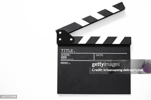 movie clapper board,movie production, - film reel table stock pictures, royalty-free photos & images