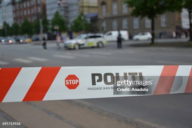 Danish police officers block traffic on H.C. Andersens Boulevard in Copenhagen near the Tivoli amusement park after a man was shot by police after he...