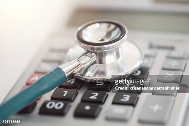 cost of health care. concept - medicaid stockfoto's en -beelden