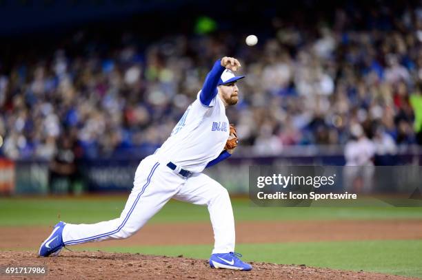 Toronto Blue Jays Pitcher Danny Barnes throws a pitch during the MLB regular season game between the Toronto Blue Jays and the New York Yankees on...