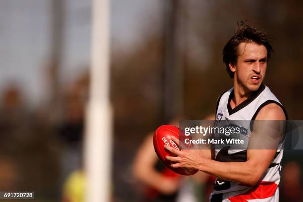 Oliver Tate of North Ballarat Roosters looks ahead during the round seven VFL match between Essendon and North Ballarat on June 3, 2017 in Melbourne,...