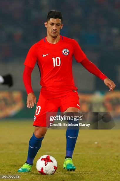 Pedro Pablo Hernandez of Chile drives the ball during a match between Chile and Burkina Faso as part of an International Friendly at Nacional Julio...