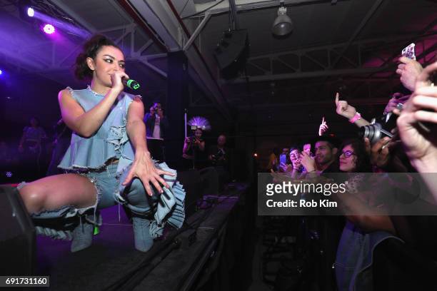 Charli XCX performs on stage at NYLON + NYLON Guys Celebrate the Music Issue at House of Vans Brooklyn on June 2, 2017 in New York City.