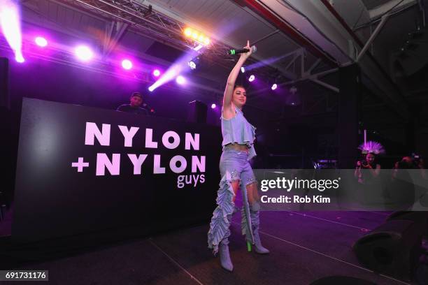 Charli XCX performs on stage at NYLON + NYLON Guys Celebrate the Music Issue at House of Vans Brooklyn on June 2, 2017 in New York City.