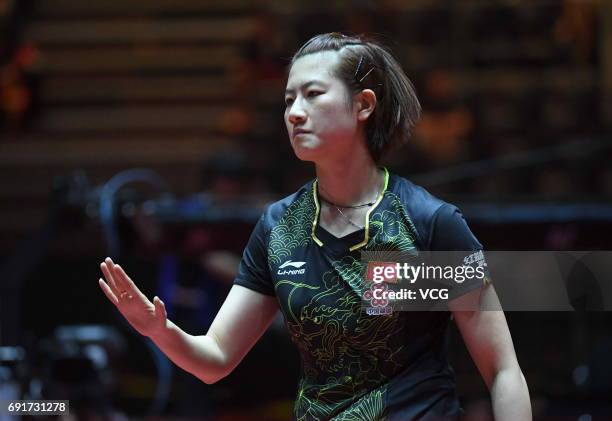 Ding Ning of China competes during Women's Singles quarterfinals against Japan's Kasumi Ishikawa on day 5 of World Table Tennis Championships at...