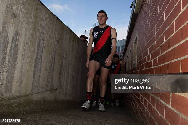 Nick O'Brien of Essendon Bombers leads the team onto the field during the round seven VFL match between Essendon and North Ballarat on June 3, 2017...