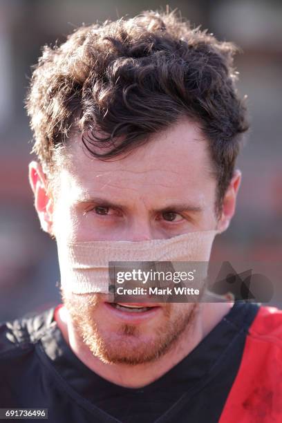 Matthew Leuenberger listens to the coaches talk at 3 quarter time during the round seven VFL match between Essendon and North Ballarat on June 3,...