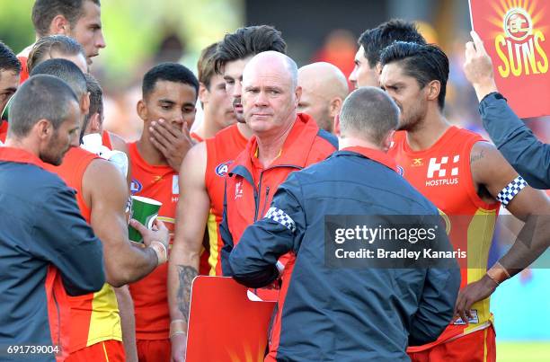 Coach Rodney Eade of the Suns at the 3rd quarter break during the round 11 AFL match between the Gold Coast Suns and the West Coast Eagles at...