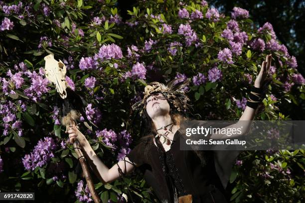 Young visitor, who said her outfit was inspired from a dream, attends the Victorian Picnic on the first day of the annual Wave-Gotik-Treffen Goth...