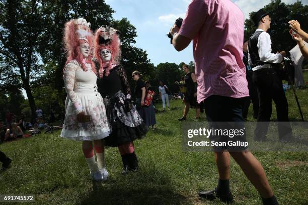 Visitors from Franconia allow themselves to be photographed as they attend their 11th annual Victorian Picnic on the first day of the annual...