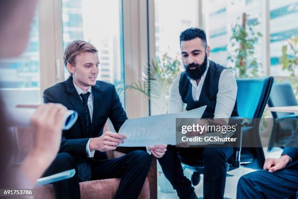 this project looks like it will cost our company a lot of money - staff meeting stock pictures, royalty-free photos & images